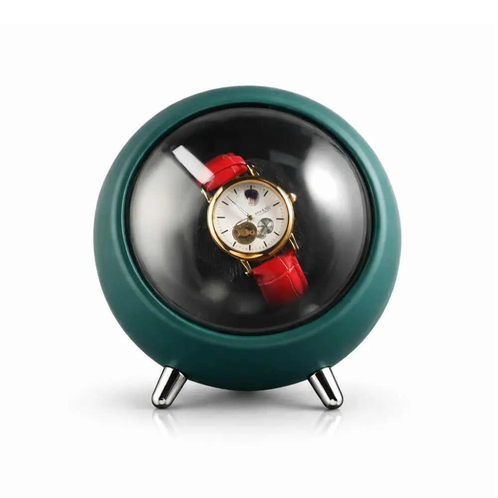 remontoir pour montres couleur vert foncé en forme de sphère 